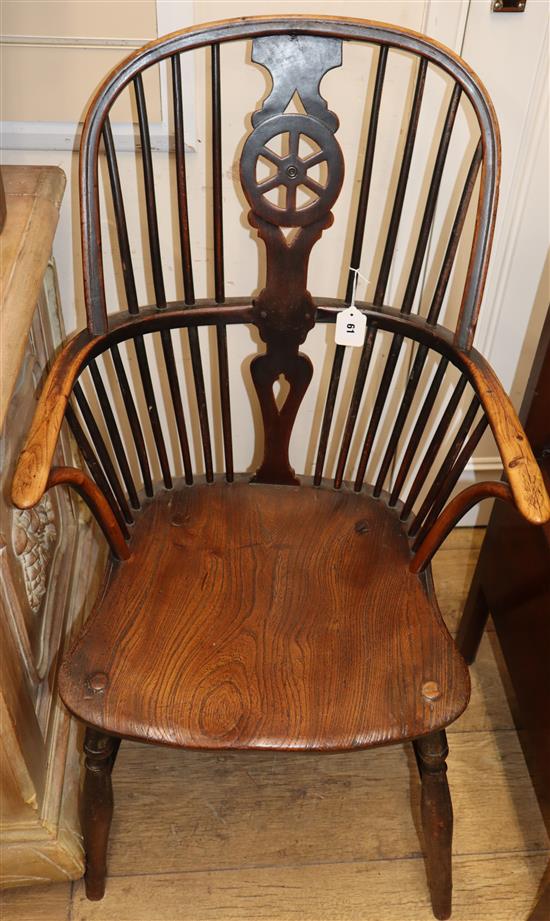 A 19th century ash and elm Windsor elbow chair